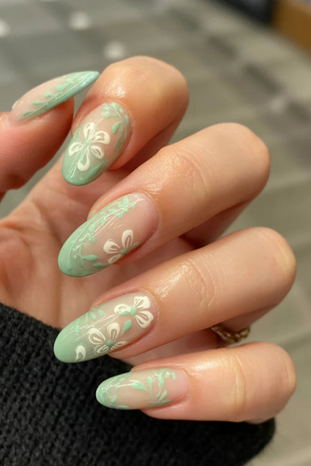 14 Sage green gradient white florals almond nails_bp