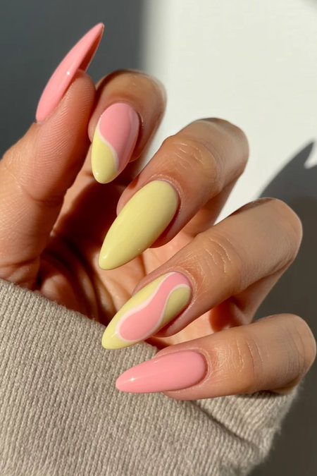 23 Long almond pink yellow nails wavy swirl designs_bp