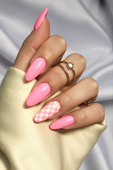 2 Almond shaped bright pink checkered accent nail_pin