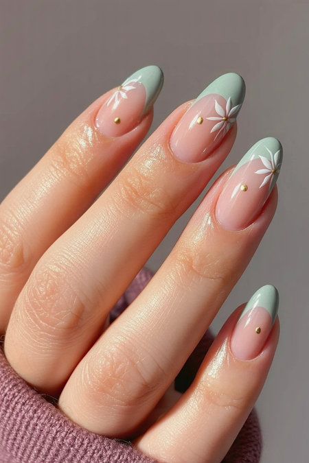 2 Almond shaped mint green french tips with white daisy flowers gold centers_pin