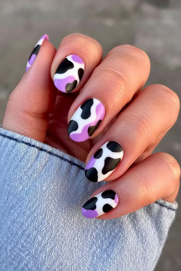 10 Cow print nails with a twist using pastel lilac and classic black_bp