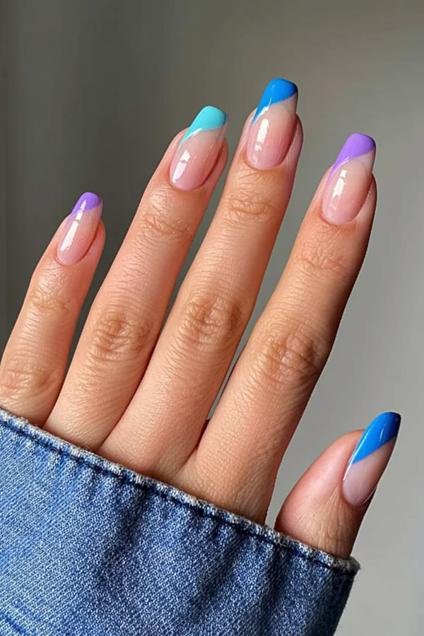 12 French manicure reinvented with a wavy colorful tip in electric blue and violet_bp